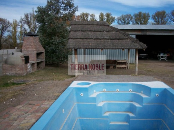 Vendo finca con galpon en Rama Caida